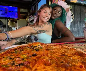 Sandbar girls with our hand tossed pizza