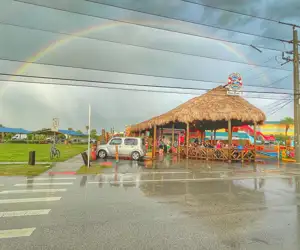 Rainbow over the Sandbar Taco Tiki Hut after a storm