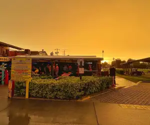 Sun setting in Cocoa Beach over Sandbar after a storm