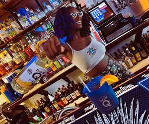 Bartender pouring drinks